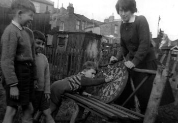 Brian, Peter, Alan Riley with Lynda (1959-60) 29 Hudson Rd.